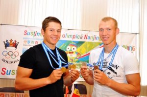 Сергей и Олег Тарновские, гребля, Молдова. У Сергея бронза за 1000 м, каное.