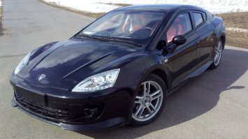 Тагаз А́квилла. Российский серийный авто. Был. С кузовом который не гниет и мотором, который не ломается. (Правда и не едет, но это традиция).
Великолепная машина за свою цену (350-450к вроде шла). И ее, я по крайней мере, обсирать точно не буду.