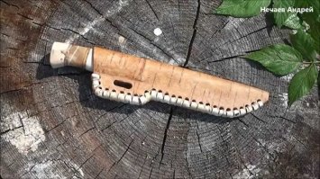 это нож Андрея Нечаева. один из первых. он уже далеко шагнул в их изготовлении вот его канал  и одна из последних его работ