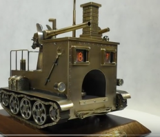 Во-первых, у гаубицы длина ствола в калибрах вдвое меньше. Во-вторых, как видно из скриншота, калибр пушки не превышает высоту кирпича, а последняя всегда равняется 65 мм. 
Конечно, можно заявить, что "по щучьему велению" высота нестандартная и равняется 6 дюймам, но в этом случае пулемет максим становится высотой в целый метр, и рост водителя печи и заряжающего должен быть под 4-5 метров, просто чтобы один до рычагов, а второй до затвора дотянулся.
Волшебство оно волшебством, но тоже имеет свои ограничения.
Лучше уж признайся, что ляпнул, не додумав.