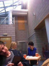 Это дверь в машинное отделение лифтового оборудования. Вход осуществляется по приставной лестнице или стремянке. Так что дверка только для персонала и нечего там делать другим =)))