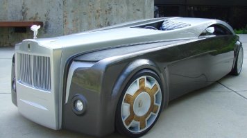 R-R, безусловно, неплох, но больно уж бентлиподобен.
и вообще, в BMW иначе видят концепт роллса.