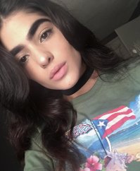 Красивая девушка. Даже чёрный пояс есть.