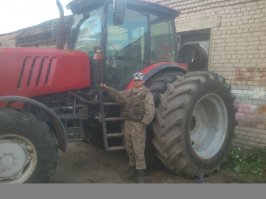 Механизатор в колхозе