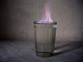 Обратимся к классике.

"-- Это водка? -- слабо спросила Маргарита.
Кот подпрыгнул на стуле от обиды.
-- Помилуйте, королева, -- прохрипел он, -- разве я позволил бы себе налить даме водки? Это чистый спирт!
Маргарита улыбнулась и сделала попытку отодвинуть от себя стакан.
-- Смело пейте, -- сказал Воланд".

Хотя, эта сцена была после работы.