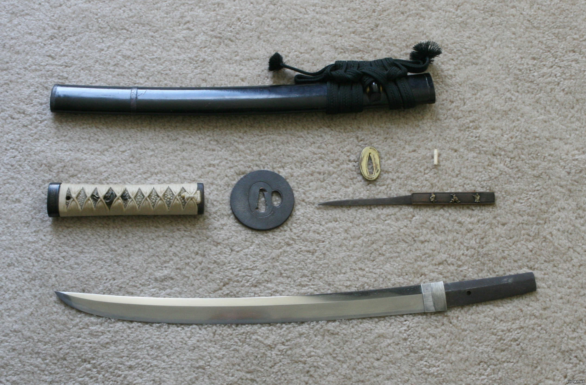 По-ходу, "знаток японских клинков" не в курсе, что меч от Мурасамы выглядит так: