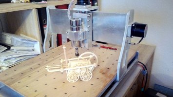 Станок обощелся в 200-250евро, рабочий обьем 450х600х70. Работаю на фирме где есть станки для лазерной резки - поэтому мой станок из 10мм и 12мм алюминия. Некоторые стыковочные поверхности отфрезерованы. Направляющие, винты, каретки и прочие мелочи с алиэкспресс. Моторы от лабораторного робота-дозатора с шагом 0.9 градуса. Шпиндель на 600 ватт. Вся электроника поместилась в станине, наружу выходят только два кабеля - сеть и усб. Станок делался для авиамоделизма - дерево, фанера, оргстекло и тонкий алямень.