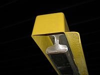 Уффф... благо сейчас контактные рельсы делают с защитным кожухом, как на фотке. Когда мужик вылазил, явно наступил на контактный рельс. Повезло, могли и поджариться оба.