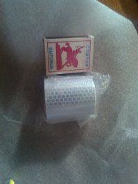 Взял в Китае вот такой "типо" скотч, отрезаем сколько нужно и клеем куда нужно, и вуаля отлично отражает, можно хоть на сумку хоть на одежду, стоит копейки.