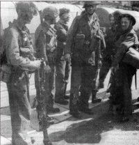 Солдаты из 3-го батальона коммандос, сфотографированные на причале в Ньюхавене после возвращения из Дьеппа.