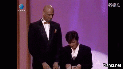 Джеки Чан и баскетболист Карим Абдул-Джаббар на 68-й церемонии вручения премии Оскар в 1996 году.