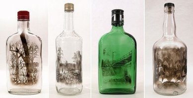 Вот ещё интересное творчество: рисунок дымом внутри бутылки... Художник Джим Динджилиан создает довольно необычные картины. Он наполняет пустые бутылки дымом, а потом аккуратно счищает гарь со стенок посудины. В итоге у него получаются удивительно детализированные, но достаточно мрачные рисунки в черных тонах.