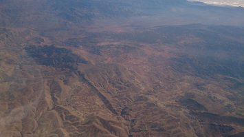 а это моё, хз, не помню, где-то над африканским побережьем. Прикололи отражения облаков в океане и марсианские пейзажи)).