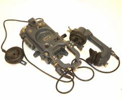 от деда достался, сейчас в гараже висит.
Палубный телефон СТА1-3/А.