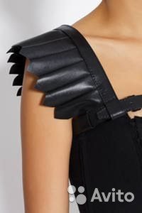 Чаще встречается под названием "портупея" и не всегда выглядит как садо-мазо девайс