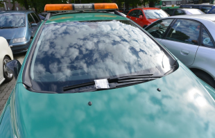 муниципальная полиция получила штраф за парковку