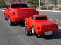 С прицепом там всё ок т.к. его основание заводское а сверху просто крышка которая разрешена так же как к примеру и тент.