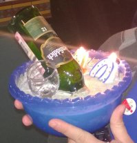 Мы с другом в подарок замуровали в раствор бетона бутылку вискаря и рюмочку. Он в итоге через пару лет не выдержал, бетон не стал долбить, сделал распил на донышке и слил содержимое )))