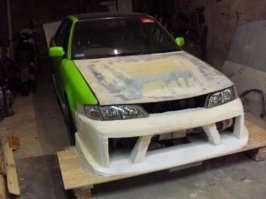 Одна необработанная целлюлоза. В 21-м веке бампера делают из более прогрессивных материалов.