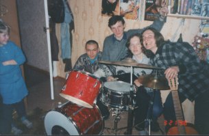 для меня 90е это "РОК" волосатый справа это я.