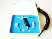 кондитерский пистолет для аэрографа. ну заливалась жидкость типа глазури или шоколада и распылялась вот современные