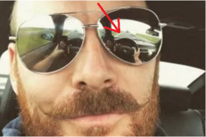 Как ни крути, ни переворачивай изображение - чел совершает обгон через встречную полосу.