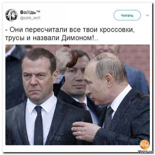 Путин возложил цветы к могиле солдата, несмотря на проливной дождь