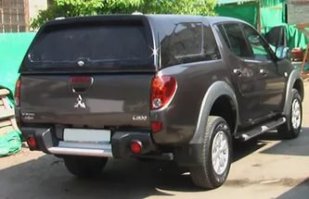 Багажник отделённый от салона имеет массу плюсов, но он слишком "низкий". был бы такой как на картинке - было бы лучше... или это доп опция?