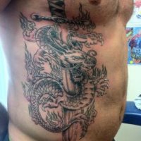 У знакомого на грудине шрам был от операции на сердце. Набил себе меч.
Или типа такого: