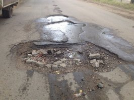 Лучшие способы засыпать дорожные ямы