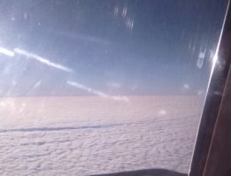 На фото земли не видно,это сплошная облачность.