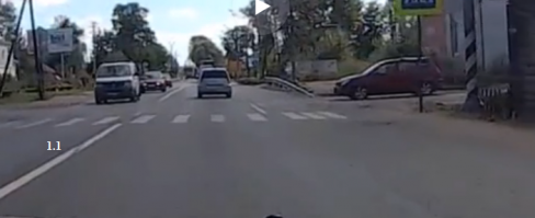 Как видно из видео линия дорожной разметки 1.1 нанесена, (что говорит о том что горизонтальная разметка нанесена, а вы ссылаетесь на пункт отсутствия дорожной разметки), затем водитель мицубиси пересекает разметку 1.1