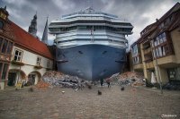 Ну не такая это уж и фантазия, реальность порою бывает эпичнее.
Честно говоря будь я жителем этого городка и увидев с моря такое, я бы о.х.у.е.л