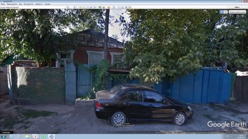 фото с гугла конкретного места сгоревших домов,есть и те которые выставил автор(но они со всего района и направлены на то,чтобы показать все в более негативном свете).