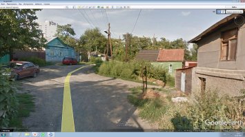 фото с гугла конкретного места сгоревших домов,есть и те которые выставил автор(но они со всего района и направлены на то,чтобы показать все в более негативном свете).