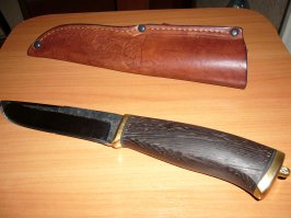 на половине картинок- говно китайское.
нож должен быть обычным, но кованым.