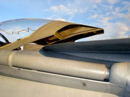 Да вроде как решили - пропилы на остеклении фонаря. Которое подголовник кресла выбивает на ура