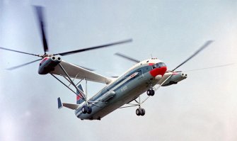 это, по сути, Ми-6, хоть и называется Ми-10 - "вертолет-кран", мощная штука!
а вот просто шедевр! Ми-12
