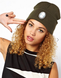 Нет. Просто шапку себе искала и там её увидела. Правда у меня тоже есть шапка такого типа, но ей уже года 3. Мне кажется, что "ноги оттуда растут" на моду шапковую :)