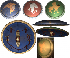 На внутренней стороне, в центре располагалась широкая бронзовая рукоять   порпакс, куда рука просовывалась до локтя, кистью руки воин сжимал вторую рукоять, расположенную у края щита   антилабе, она изготавливалась из шнура или кожаного ремешка, пропущенного через две бронзовых петли. Часто по периметру щита располагались кольца, через которые пропускался шнур, образующий антилабе, на этом шнуре щит можно было перебросить через плечо, например, на марше.