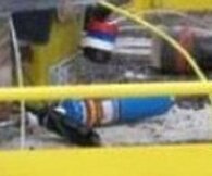 И чё? Это пиндосы или канадосы. Если кто то работает в колодце то он должен быть огражден. Табличка прилагается к забору по умолчанию. Если посмотреть внимательнее то можно заметить газовую горелку. Так что про сигарету вообще забываем.