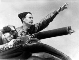 Из пулемёта.