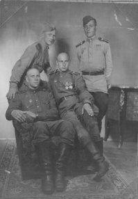 Мой отец воевал на ЗИС-3. 
Сначала - наводчиком, а в конце войны - командиром орудия. 
Закончил войну в Айзенахе и потом дослуживал на Балтике комендором (он с 23 года, а демобилизовали сначала "стариков").
Был тяжело ранен. При поддержке наступающей пехоты перекатывали орудие, а щиток, прикрывающий ноги, не опустили. Так и словил он в бедро (стоял на колене) три пули из МГ 42. Две - навылет и одна застряла в кости. Ногу сохранили, но прихрамывал до конца жизни.
Снимок сделан в Берлине в мае 45г. Папа - на подлокотнике кресла.