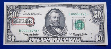 Старого образца, посмотрите по внимательнее! По телеку предупреждали граждан, что бы по внимательнее смотрели на президентов.