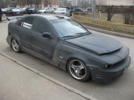 Африканцы еще нормально сделали.

Вот это настоящий ужас.
Это две тачки в одной.  Часть кузова ниссана свапнута в кузов бмв.