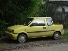 Это слегка переделанный Daihatsu Miracab