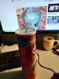 А у меня банка из под чипсов. Скидываю всю мелочь меньше 50 пенсов. за год около  50 набегает.