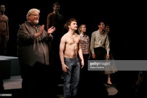 он очень много на сцене играет в Англии