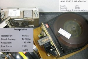 Я бы добавил, что название «винчестер» (англ. Winchester) накопитель получил благодаря работавшему в фирме IBM Кеннету Хотону, под руководством которого в 1973 году был выпущен жёсткий диск модели 3340, впервые объединивший в одном неразъёмном корпусе пластины диска и считывающие головки. При его разработке инженеры использовали краткое внутреннее название «30-30», что означало два модуля (в максимальной компоновке) по 30 мегабайт каждый, что по созвучию совпадало с обозначением популярного винтовочного патрона .30-30 Winchester для винтовки Winchester Model 1894. 
В Европе и США название «винчестер» вышло из употребления ещё в 1990-х годах, у нас же встречается в компьютерном сленге до сих пор, правда сократившись до слова "винт". 
Справа на фото из музея компьютеров.