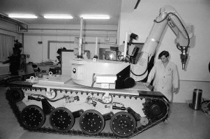 Эти роботы не способны работать в условиях радиации так как полупроводниковая электроника очень быстро деградирует от ионизирующего излучения.
Вот роботы спроектированные для такой работы.